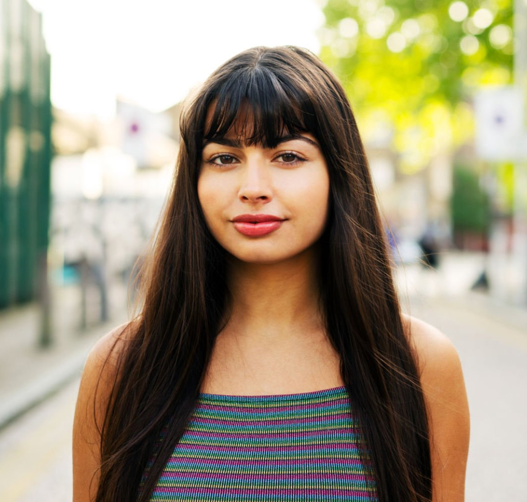 young woman with bangs
