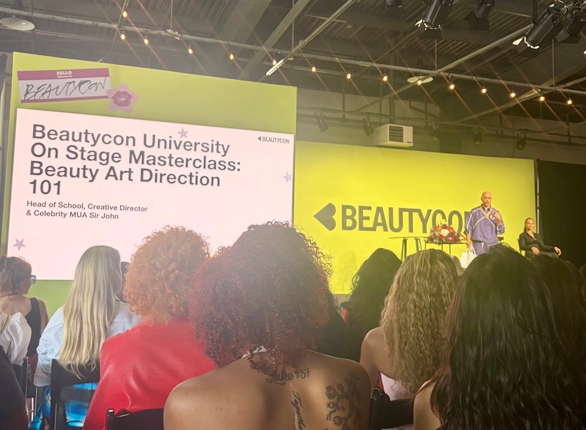 Sir John on stage at Beautycon